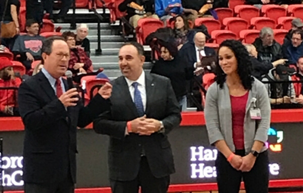 President Woodward HHC President Flaks and physical therapist Latasha Raineault on basketball court